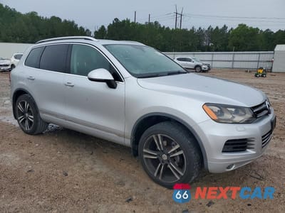 Czwarte zdjęcie samochodu z boku: 2012 VOLKSWAGEN TOUAREG V6 VIN:WVGFF9BP2CD002994 - miniatura