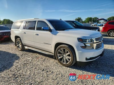 Czwarte zdjęcie samochodu z boku: 2015 CHEVROLET SUBURBAN K1500 LTZ VIN:1GNSKKKC0FR240473 - miniatura
