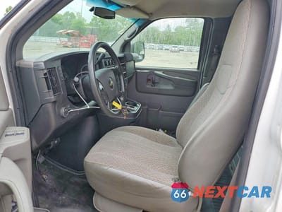 Zdjęcie 7 z 14 samochodu: 2014 CHEVROLET EXPRESS G1500 VIN:1GCSHAF44E1140068 - miniatura