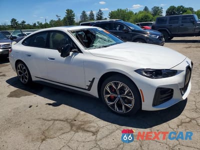 Czwarte zdjęcie samochodu z boku: 2024 BMW I4 EDRIVE 35 VIN:WBY43AW04RFR71887 - miniatura