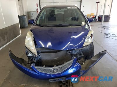 Piąte zdjęcie samochodu w środku: 2011 HONDA FIT SPORT VIN:JHMGE8H55BC015303 - miniatura