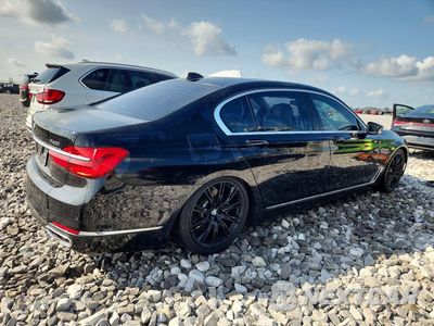 Trzecie zdjęcie samochodu z tyłu: 2019 BMW 740 I VIN:WBA7E2C52KB218383 - miniatura