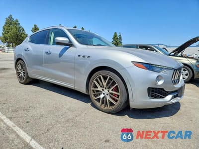 Czwarte zdjęcie samochodu z boku: 2017 MASERATI LEVANTE S LUXURY VIN:ZN661YUL4HX252166 - miniatura