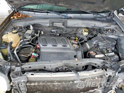 Zdjęcie 12 z 13 samochodu: 2003 FORD ESCAPE VIN:1FMYU03123KE14008 - miniatura