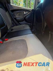 Zdjęcie 6 z 10 samochodu: 2010 HYUNDAI TUCSON GLS VIN:KM8JU3AC9AU040098 - miniatura