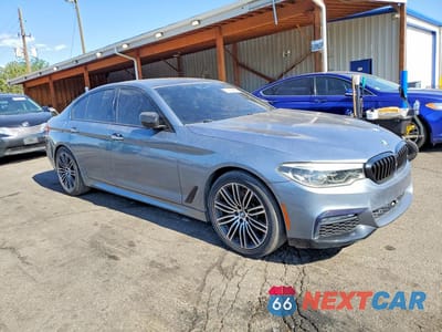 Czwarte zdjęcie samochodu z boku: 2017 BMW 530 XI VIN:WBAJA7C31HWA70034 - miniatura