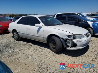 Czwarte zdjęcie samochodu z boku: 2001 TOYOTA CAMRY CE VIN:4T1BG22K11U868917 - miniatura