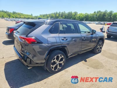 Trzecie zdjęcie samochodu z tyłu: 2024 TOYOTA RAV4 PRIME XSE VIN:JTMFB3FV6RD177490 - miniatura