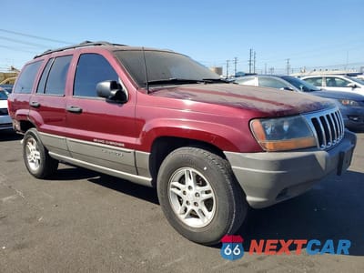 Czwarte zdjęcie samochodu z boku: 2002 JEEP GRAND CHEROKEE LAREDO VIN:1J4GX48S42C141396 - miniatura