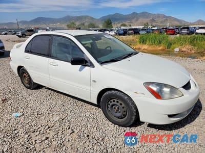 Czwarte zdjęcie samochodu z boku: 2004 MITSUBISHI LANCER ES VIN:JA3AJ26E24U066742 - miniatura