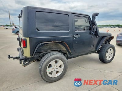 Trzecie zdjęcie samochodu z tyłu: 2010 JEEP WRANGLER SPORT VIN:1J4AA2D14AL216900 - miniatura