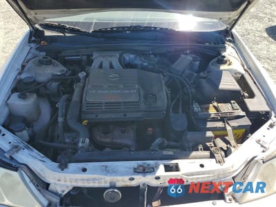 Zdjęcie 11 z 12 samochodu: 2002 TOYOTA AVALON XLS VIN:4T1BF28B22U253272 - miniatura