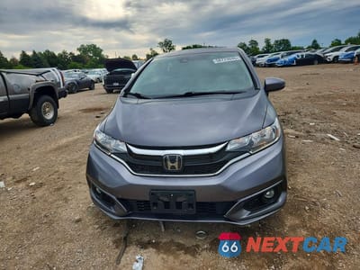 Piąte zdjęcie samochodu w środku: 2018 HONDA FIT EX VIN:3HGGK5H94JM710981 - miniatura