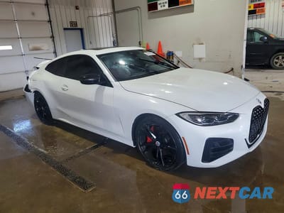 Czwarte zdjęcie samochodu z boku: 2021 BMW M440XI VIN:WBA13AR07MCF69615 - miniatura