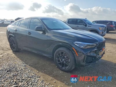 Czwarte zdjęcie samochodu z boku: 2022 BMW X6 XDRIVE40I VIN:5UXCY6C07N9K31273 - miniatura