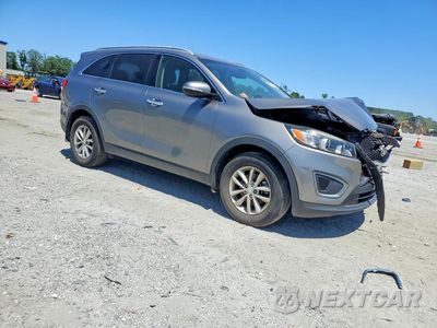 Czwarte zdjęcie samochodu z boku: 2016 KIA SORENTO LX VIN:5XYPG4A39GG016860 - miniatura