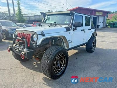 2014 JEEP WRANGLER UNLIMITED SPORT 1C4BJWDG7EL203909 - główne zdjęcie licytacji z USA - miniatura