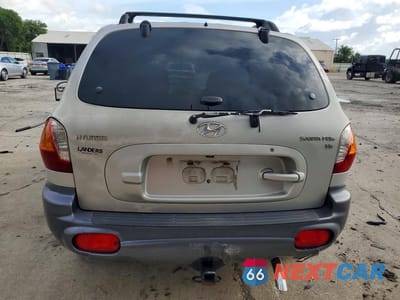 Zdjęcie 6 z 12 samochodu: 2004 HYUNDAI SANTA FE GLS VIN:KM8SC13D34U658992 - miniatura