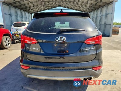 Zdjęcie 6 z 13 samochodu: 2014 HYUNDAI SANTA FE SPORT 2.0T VIN:5XYZU3LA1EG227815 - miniatura