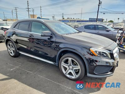 Czwarte zdjęcie samochodu z boku: 2015 MERCEDES-BENZ GLA 250 4MATIC VIN:WDCTG4GBXFJ075499 - miniatura