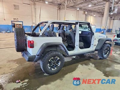 Trzecie zdjęcie samochodu z tyłu: 2026 JEEP WRANGLER RUBICON VIN:1C4PJXFN3TW283700 - miniatura