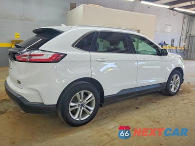 Trzecie zdjęcie samochodu z tyłu: 2020 FORD EDGE SEL VIN:2FMPK4J91LBA28983 - miniatura