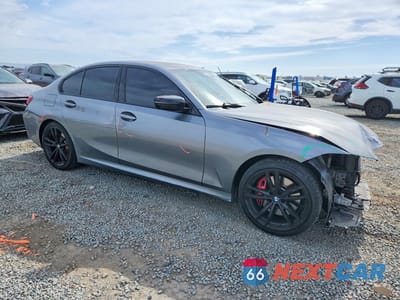 Czwarte zdjęcie samochodu z boku: 2023 BMW 330XI VIN:3MW89FF05P8D69095 - miniatura