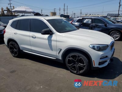 Czwarte zdjęcie samochodu z boku: 2019 BMW X3 SDRIVE30I VIN:5UXTR7C55KLF24525 - miniatura