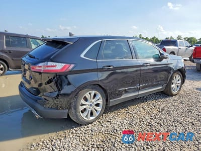 Trzecie zdjęcie samochodu z tyłu: 2022 FORD EDGE TITANIUM VIN:2FMPK4K9XNBA16266 - miniatura