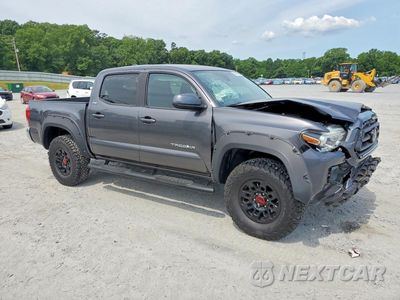 Czwarte zdjęcie samochodu z boku: 2020 TOYOTA TACOMA SR5 V6 VIN:3TYCZ5AN8LT007150 - miniatura