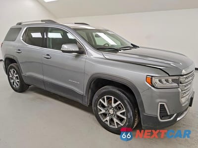 Czwarte zdjęcie samochodu z boku: 2023 GMC ACADIA SLT VIN:1GKKNML45PZ199346 - miniatura