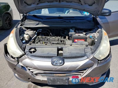 Zdjęcie 11 z 12 samochodu: 2010 HYUNDAI TUCSON GLS VIN:KM8JT3AC3AU076498 - miniatura