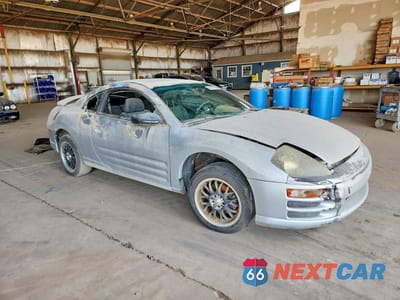 Czwarte zdjęcie samochodu z boku: 2002 MITSUBISHI ECLIPSE GS VIN:4A3AC44G32E095750 - miniatura