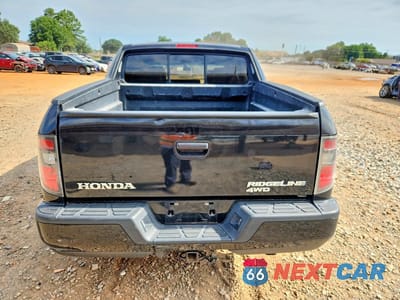 Zdjęcie 6 z 13 samochodu: 2012 HONDA RIDGELINE SPORT VIN:5FPYK1F79CB002026 - miniatura