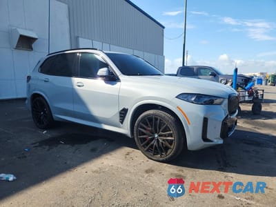 Czwarte zdjęcie samochodu z boku: 2026 BMW X5 SDRIVE 40I VIN:5UX13EU05T9249279 - miniatura