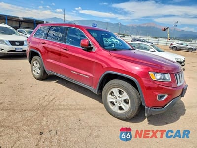 Czwarte zdjęcie samochodu z boku: 2015 JEEP GRAND CHEROKEE LAREDO VIN:1C4RJFAG6FC225260 - miniatura