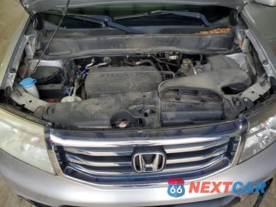 Zdjęcie 12 z 13 samochodu: 2014 HONDA PILOT EXL VIN:5FNYF4H5XEB041883 - miniatura
