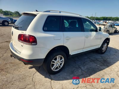 Trzecie zdjęcie samochodu z tyłu: 2009 VOLKSWAGEN TOUAREG 2 V6 VIN:WVGBE77L59D015999 - miniatura