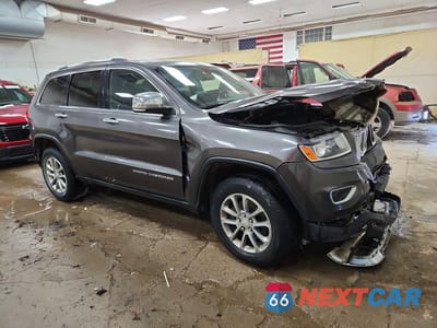Czwarte zdjęcie samochodu z boku: 2014 JEEP GRAND CHEROKEE LIMITED VIN:1C4RJFBG2EC210090 - miniatura