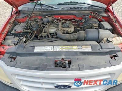 Zdjęcie 11 z 13 samochodu: 1999 FORD F-150 VIN:1FTZX1724XNC04670 - miniatura