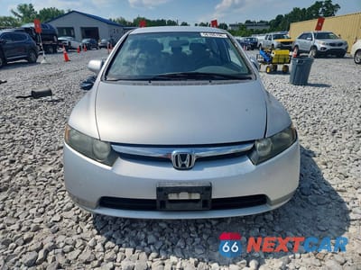 Piąte zdjęcie samochodu w środku: 2007 HONDA CIVIC LX VIN:1HGFA15547L113073 - miniatura