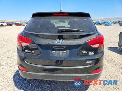 Zdjęcie 6 z 12 samochodu: 2013 HYUNDAI TUCSON LIMITED VIN:KM8JUCAC7DU581428 - miniatura
