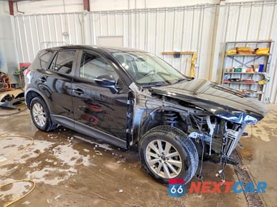Czwarte zdjęcie samochodu z boku: 2015 MAZDA CX-5 TOURING VIN:JM3KE4CY9F0477691 - miniatura