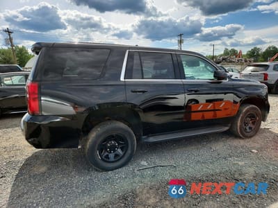Trzecie zdjęcie samochodu z tyłu: 2019 CHEVROLET TAHOE POLICE VIN:1GNSKDEC1KR323864 - miniatura