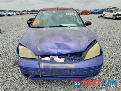 Piąte zdjęcie samochodu w środku: 2005 FORD FOCUS VIN:3FAFP31N05R128057 - miniatura