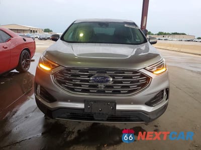 Piąte zdjęcie samochodu w środku: 2022 FORD EDGE TITANIUM- R&D- CLN TITLE- PRI FLEET VIN:2FMPK4K9XNBB04458 - miniatura