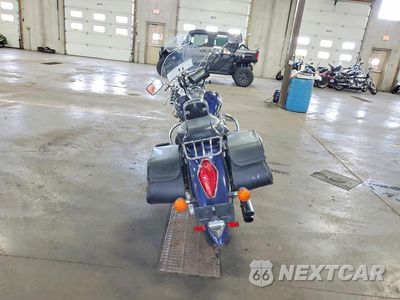 Czwarte zdjęcie samochodu z boku: 2004 HONDA VT1300 S VIN:1HFSC52034A104384 - miniatura