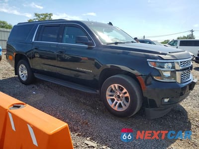 Czwarte zdjęcie samochodu z boku: 2016 CHEVROLET SUBURBAN K1500 LT VIN:1GNSKHKC6GR368172 - miniatura
