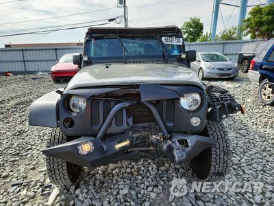 Piąte zdjęcie samochodu w środku: 2015 JEEP WRANGLER UNLIMITED SPORT VIN:1C4BJWDGXFL740128 - miniatura