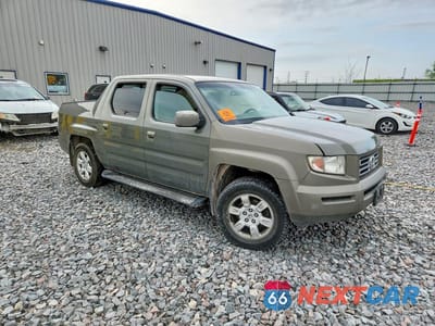 Czwarte zdjęcie samochodu z boku: 2007 HONDA RIDGELINE RT VIN:2HJYK16427H526483 - miniatura